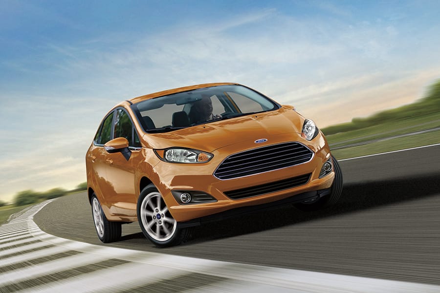 Orange coloured Ford Fiesta