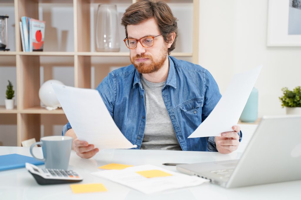 man checking credit and fed up