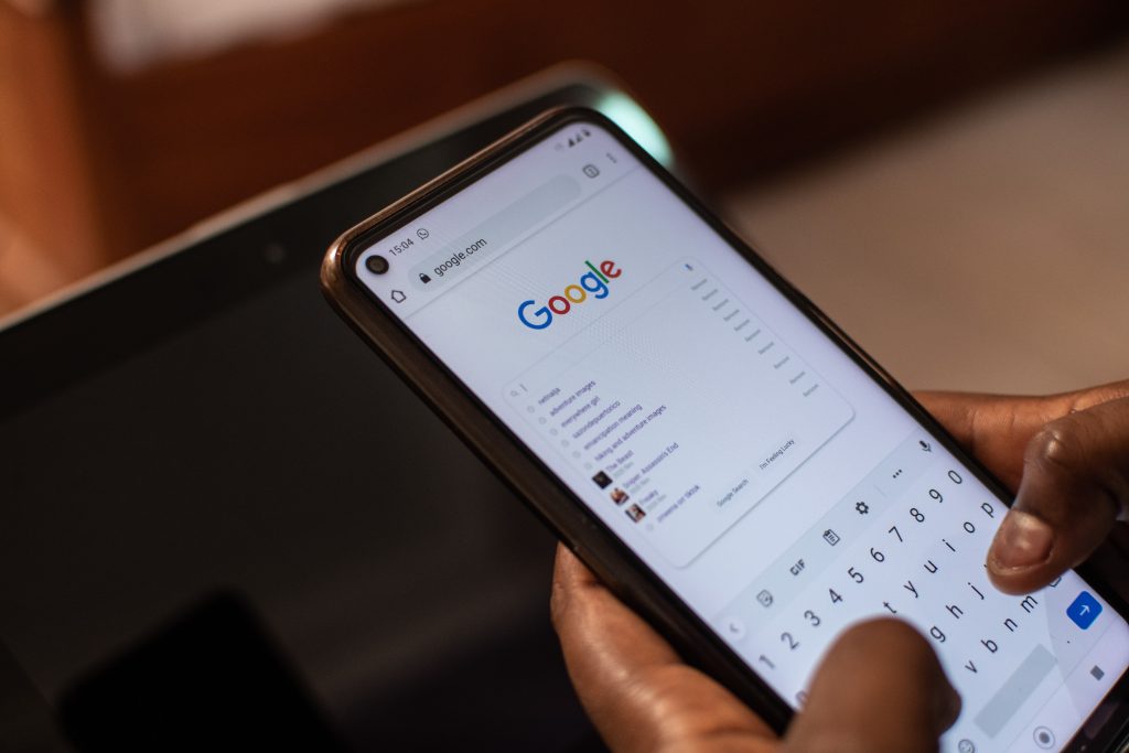 man using google on mobile phone