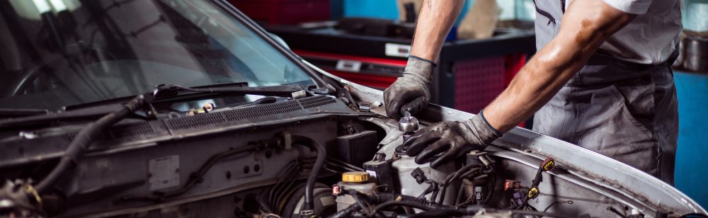 Mechanic working on a car