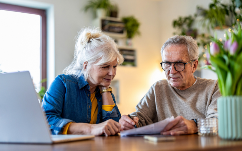 man and woman looking at life insurance