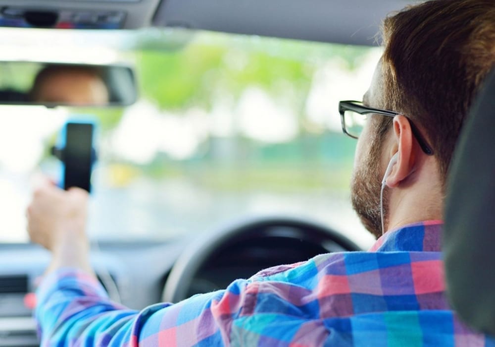 driving wearing headphones