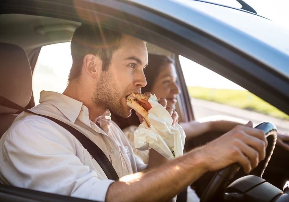 is it illegal to eat while driving?