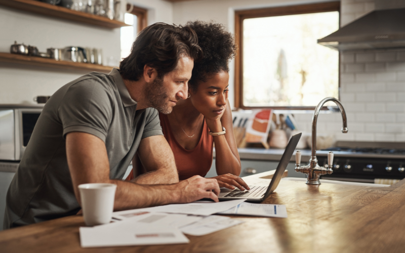 man and woman looking for loans