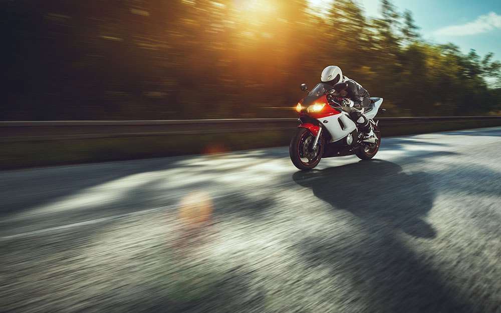 Motorbike driving along the road