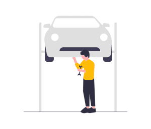 man fixing a car during service